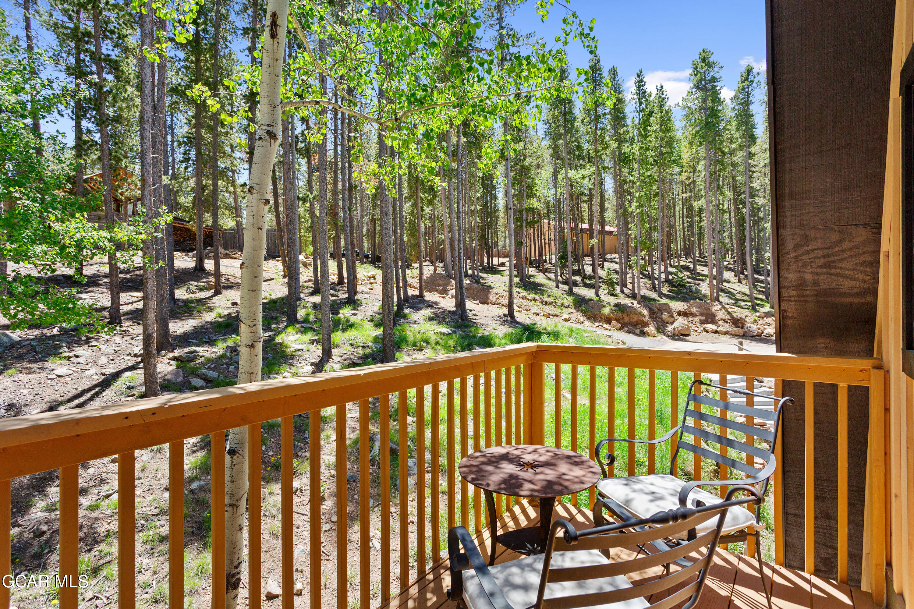 60 Paiute Road Evergreen, CO 80439 - Photo 29 of 45 60_PaiuteRd_0032_PrimarySuiteBalcony