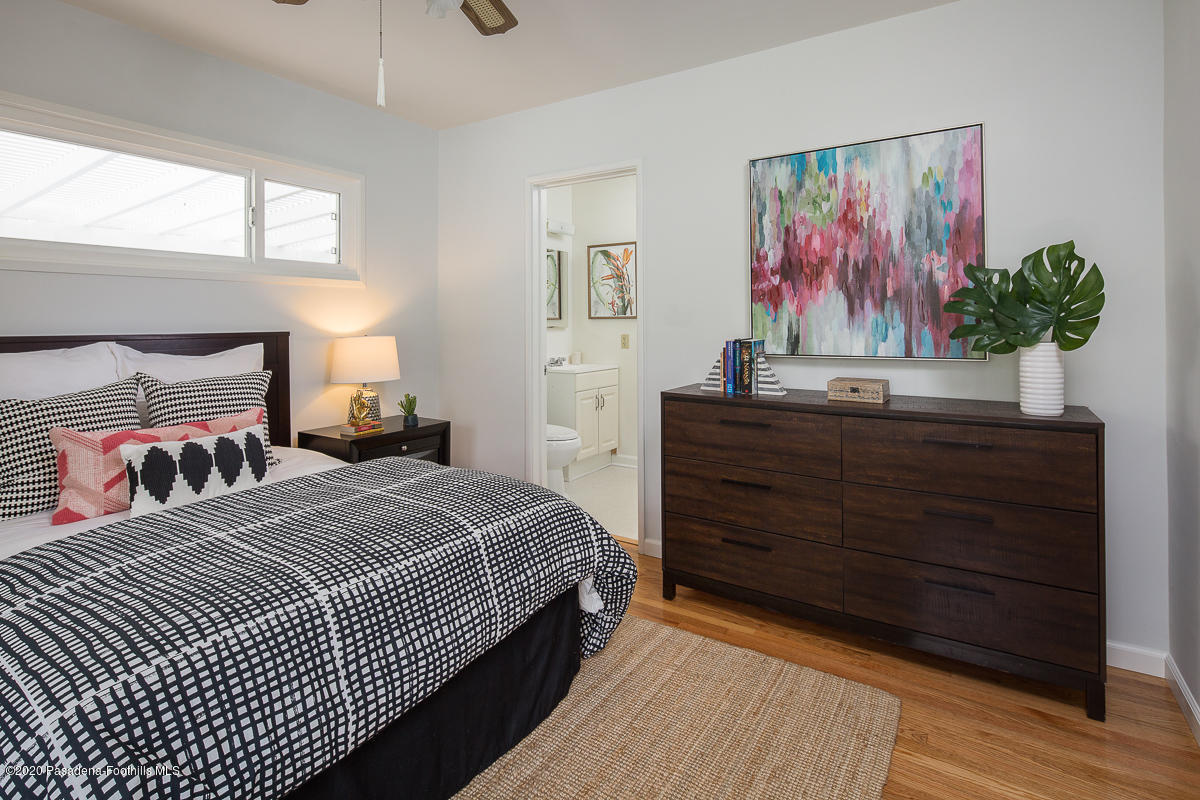 3680 Newhaven Road Pasadena, CA 91107 - Photo 22 of 41 a bedroom with a bed and a painting on the wall