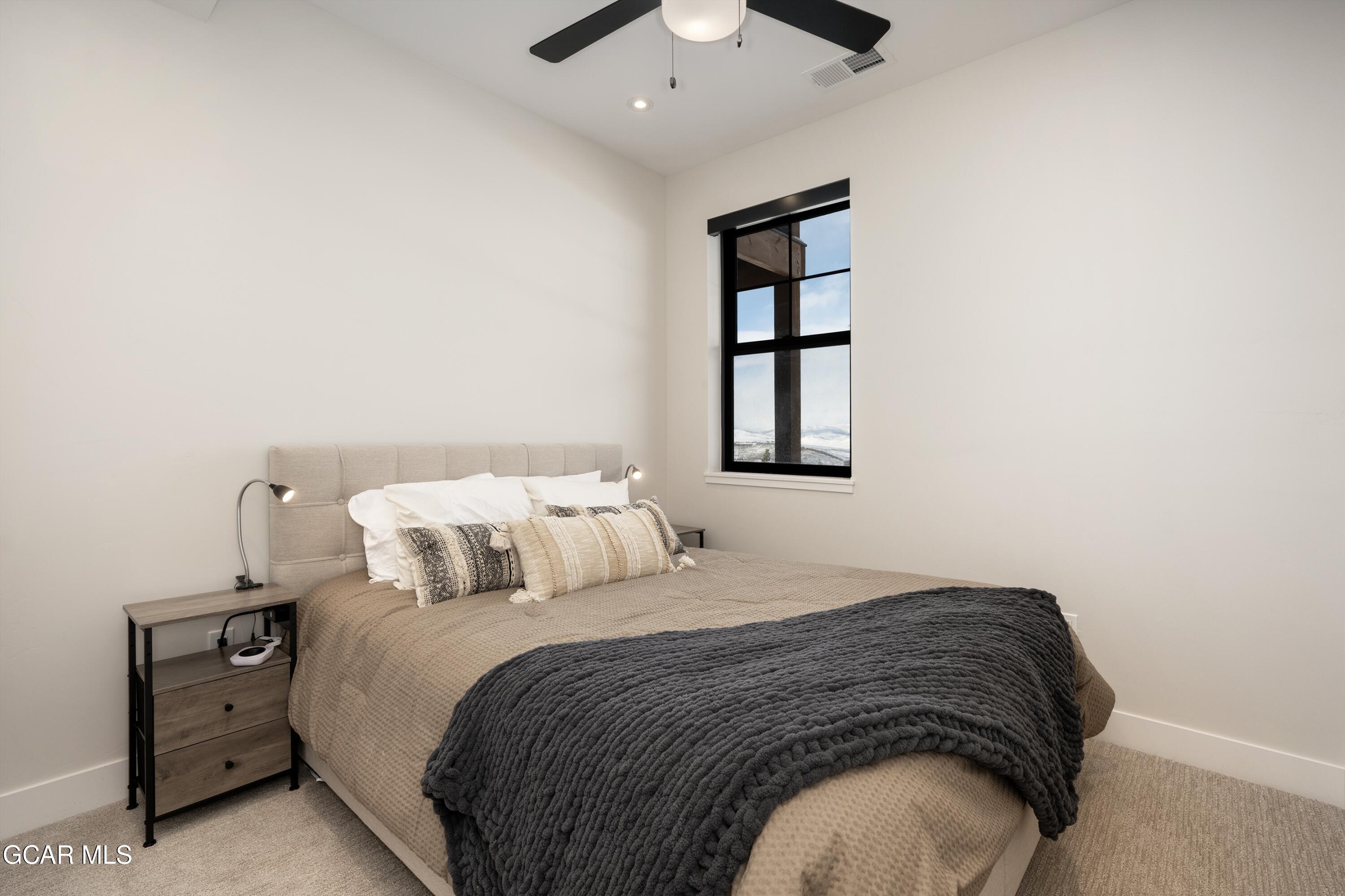 103 Saddle Mountain Camp Road Granby, CO 80446 - Photo 17 of 38 Lower Level Bed 1-1