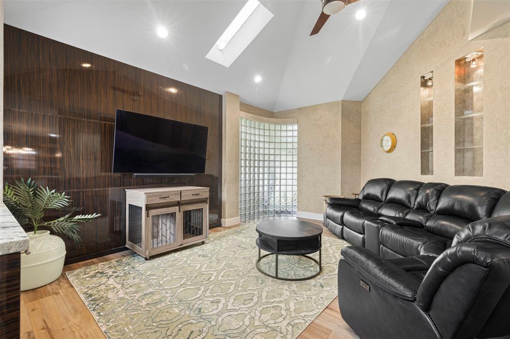 3371 Regent Drive Dallas, TX 75229 - Photo 18 of 36 Venetian plaster and dry bar elevate the space.
