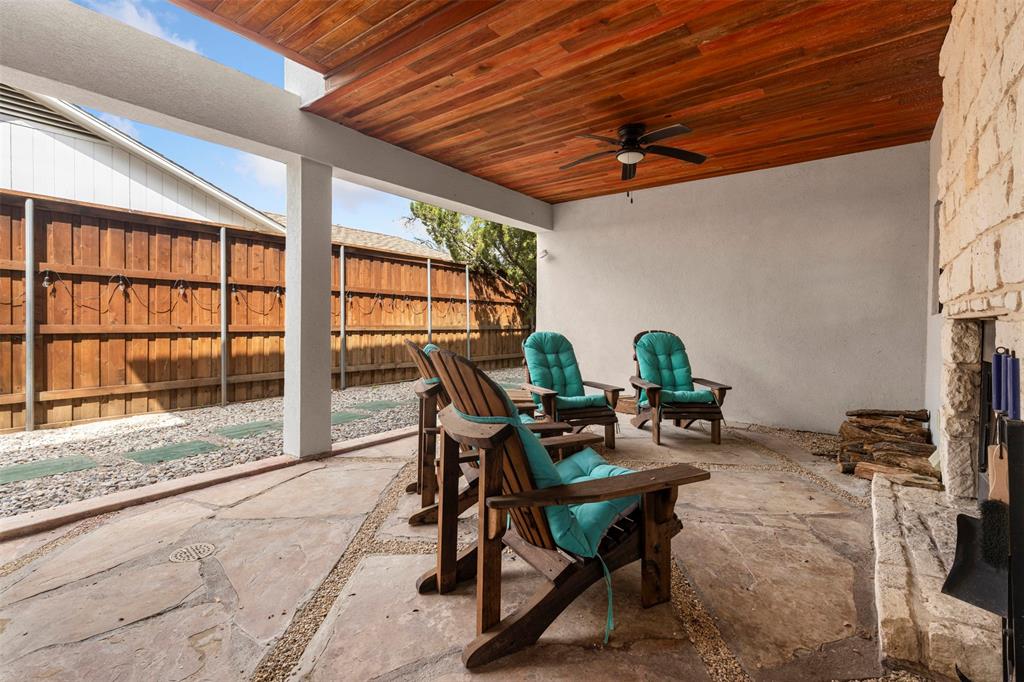 3371 Regent Drive Dallas, TX 75229 - Photo 26 of 36 Private patio with a wood-burning fireplace!