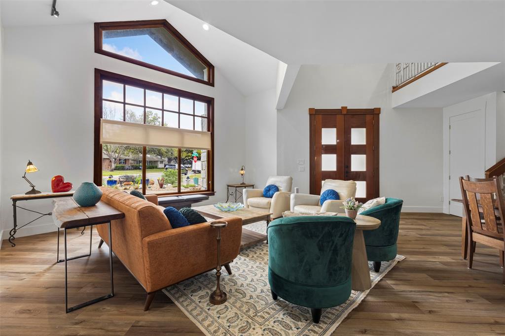 3371 Regent Drive Dallas, TX 75229 - Photo 3 of 36 Double height entry + cathedral ceilings in the front living space.