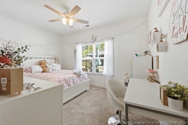 7289 Fire Dept Road Hope Mills, NC 28348 - Photo 29 of 49 a bedroom with a bed and window