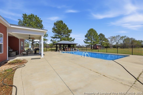 7289 Fire Dept Road Hope Mills, NC 28348 - Photo 36 of 49 a view of a swimming pool and a yard