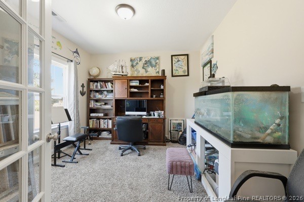 7289 Fire Dept Road Hope Mills, NC 28348 - Photo 7 of 49 a room with furniture and a flat screen tv