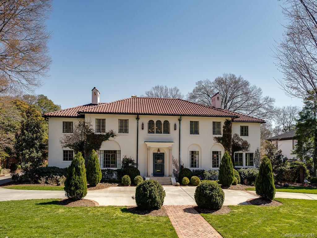 a view of a house with yard porch and sitting area