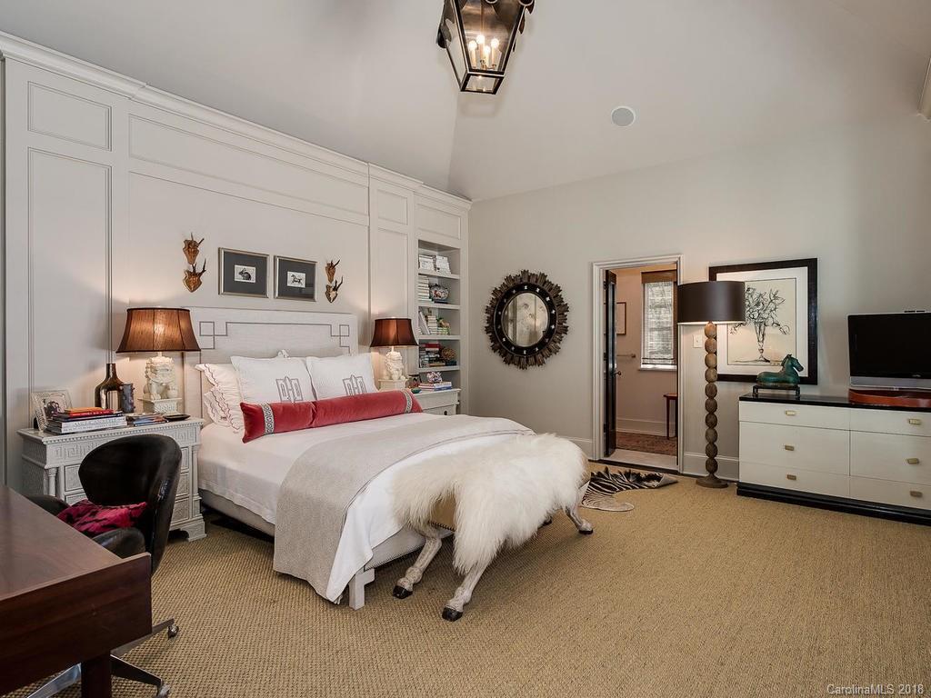 661 Colville Road Charlotte, NC 28207 - Photo 16 of 36 a bedroom with a bed and view of living room