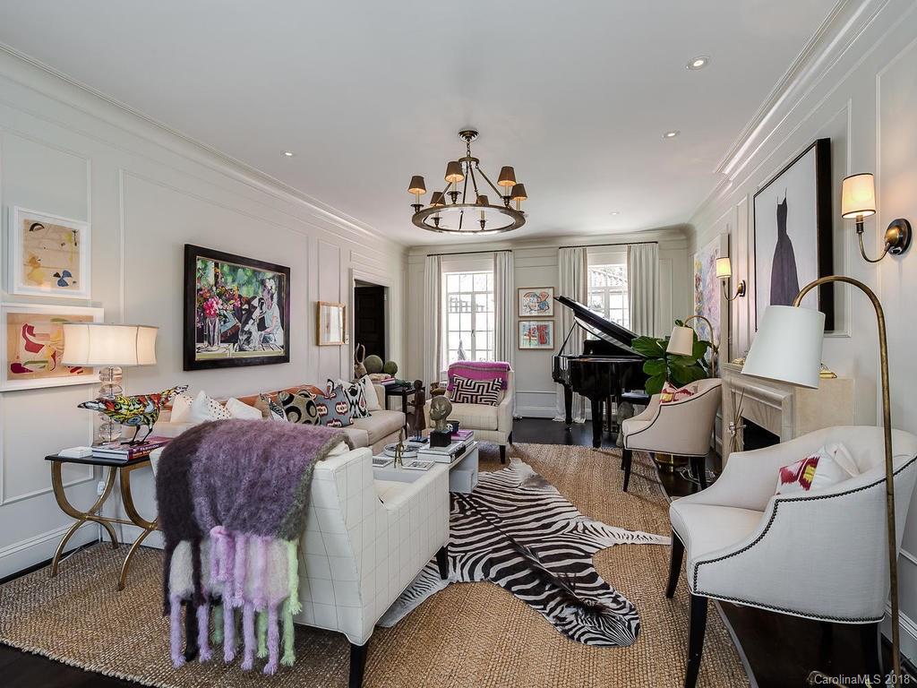 661 Colville Road Charlotte, NC 28207 - Photo 3 of 36 a living room with furniture a window and a flat screen tv