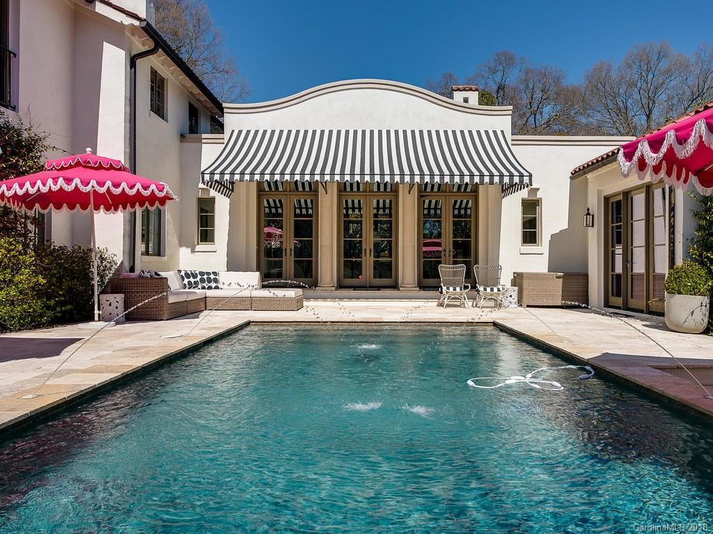 661 Colville Road Charlotte, NC 28207 - Photo 34 of 36 a view of a house with swimming pool and sitting area
