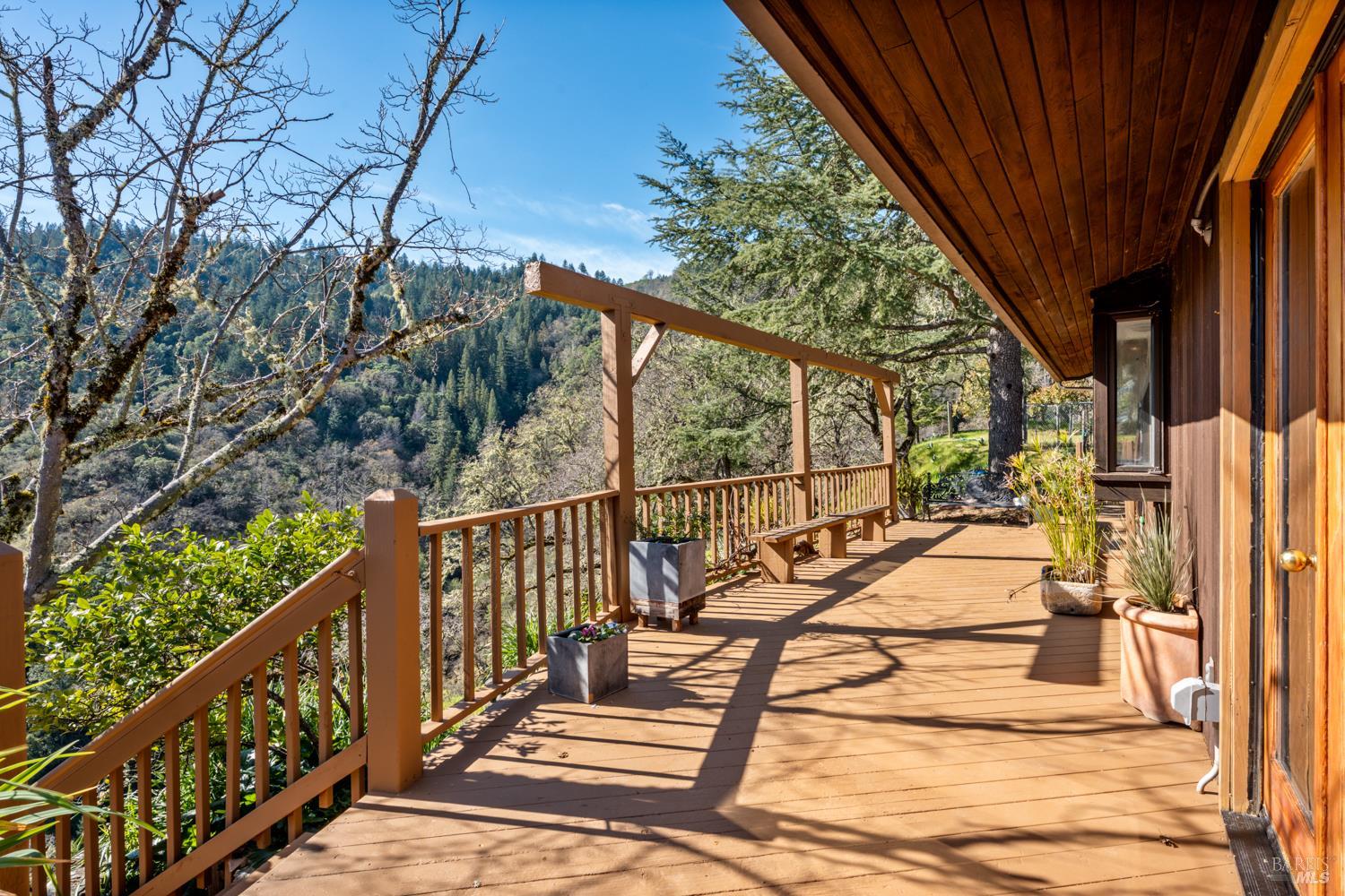 1411 Oak Knoll Road Ukiah, CA 95482 - Photo 4 of 45 a view of balcony with wooden floor and fence