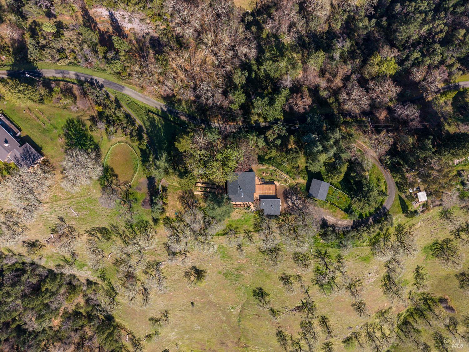 1411 Oak Knoll Road Ukiah, CA 95482 - Photo 42 of 45 a backyard of a house with table and chairs