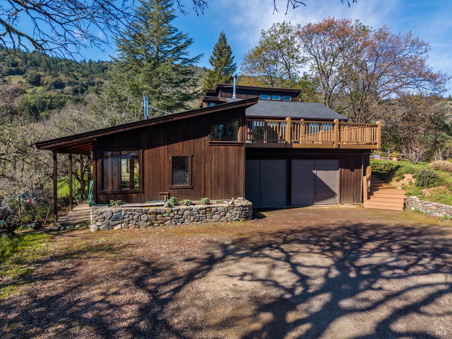 1411 Oak Knoll Road Ukiah, CA 95482 - Photo 44 of 45 a front view of a house with a yard