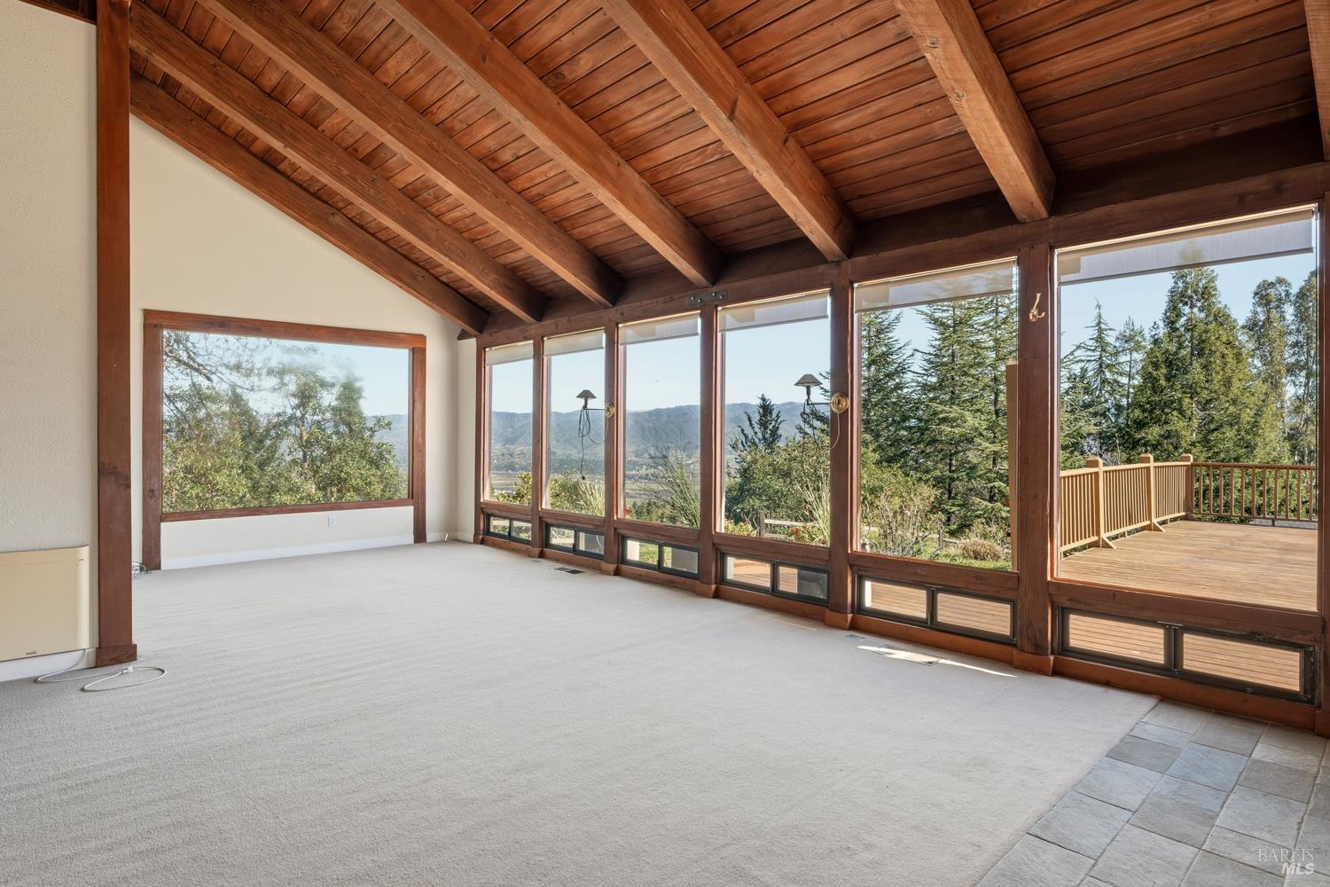 1411 Oak Knoll Road Ukiah, CA 95482 - Photo 8 of 45 a view of an empty room with windows and city view