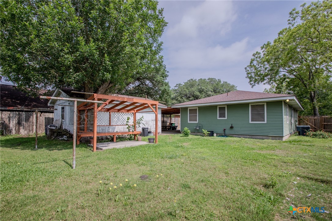 2903 Gayle Street Victoria, TX 77901 - Photo 21 of 21 a front view of a house with a yard