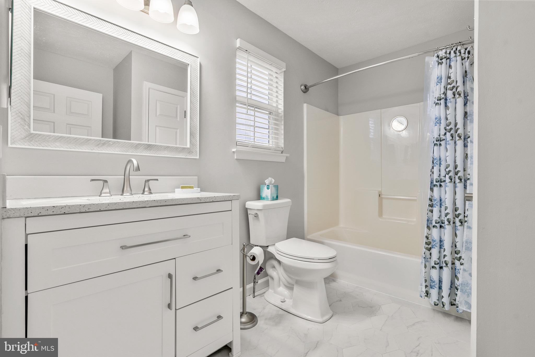 154 Sharpless Boulevard Westampton, NJ 08060 - Photo 19 of 22 a bathroom with a sink toilet a mirror and shower