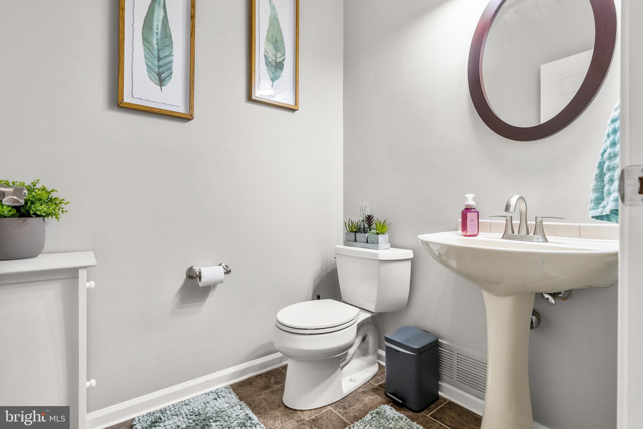 154 Sharpless Boulevard Westampton, NJ 08060 - Photo 9 of 22 a bathroom with a sink and a mirror