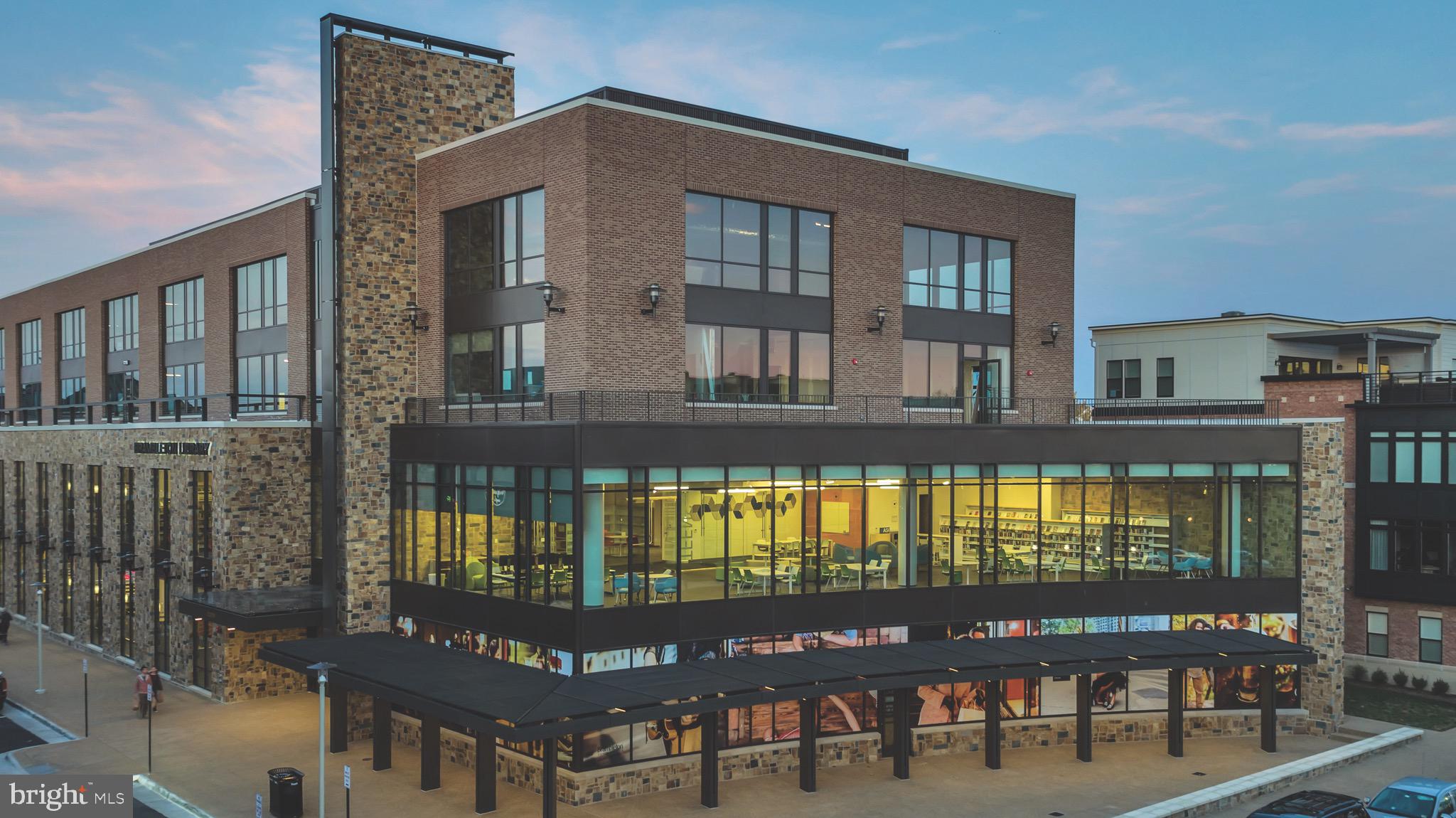 22786 Hanson Overlook Terrace Ashburn, VA 20148 - Photo 18 of 21 a front view of a house with a porch