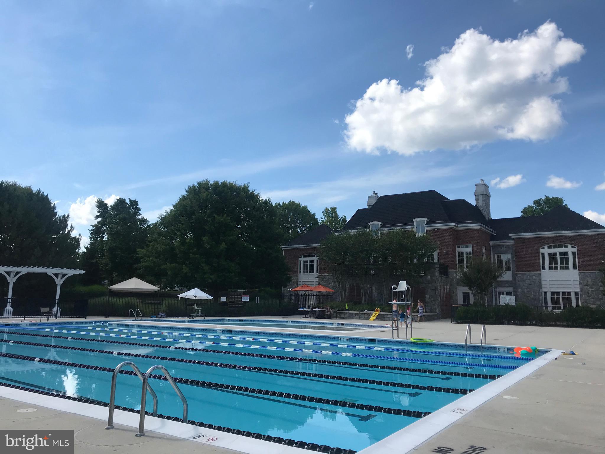 22786 Hanson Overlook Terrace Ashburn, VA 20148 - Photo 19 of 21 a view of house with swimming pool and furniture
