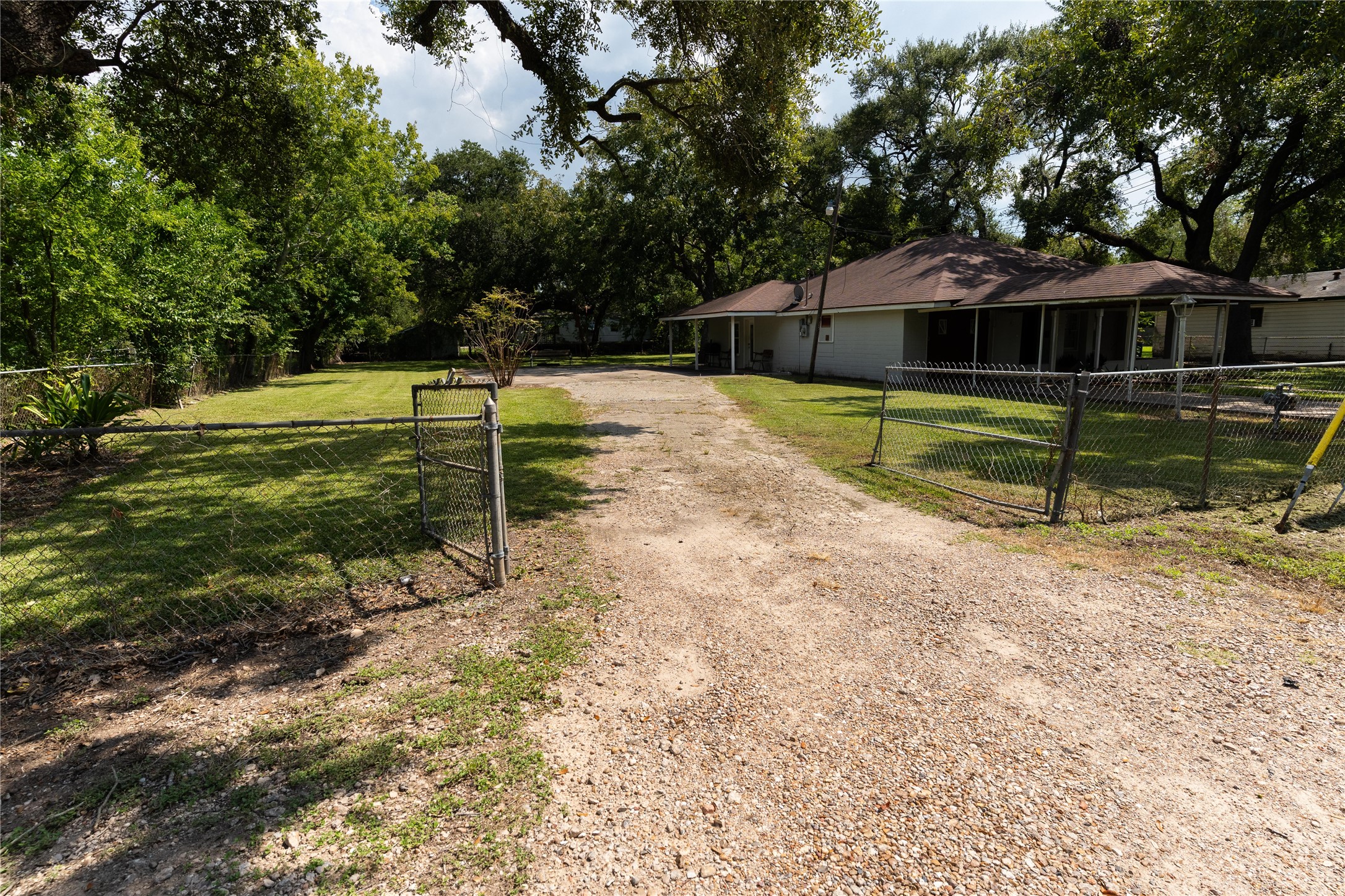 417 Hardy Street Clute, TX 77531 - Photo 22 of 28 a view of a house with a yard