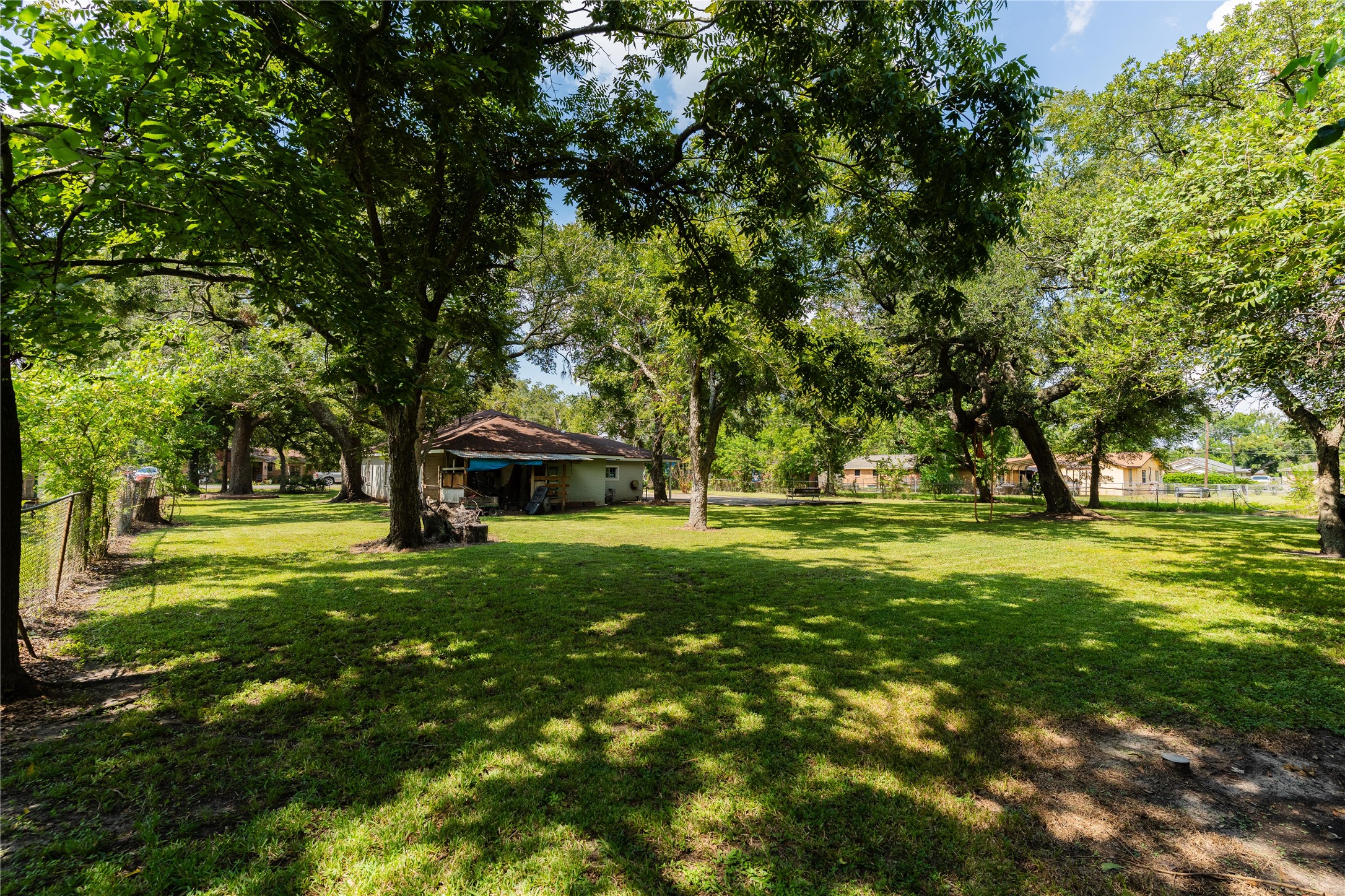417 Hardy Street Clute, TX 77531 - Photo 23 of 28 a front view of a house with a garden