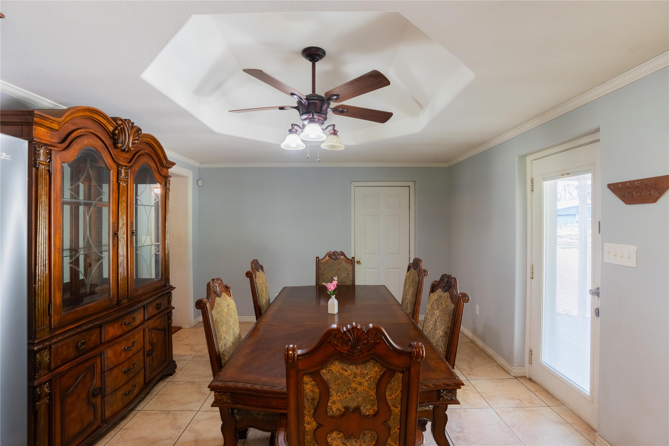 417 Hardy Street Clute, TX 77531 - Photo 4 of 28 a view of a dining room with furniture and a chandelier