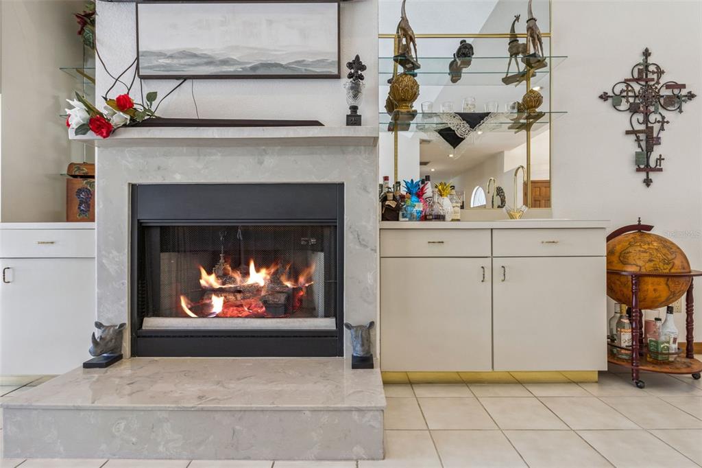 2964 Plantation Road Winter Haven, FL 33884 - Photo 7 of 42 a living room with furniture and a fireplace