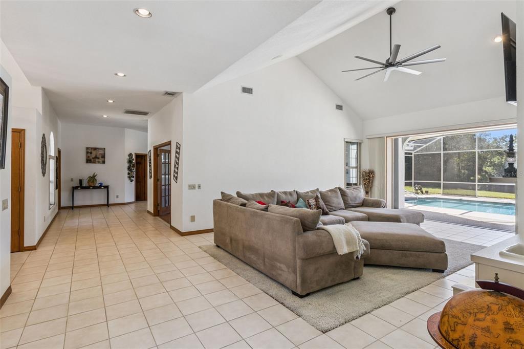 2964 Plantation Road Winter Haven, FL 33884 - Photo 8 of 42 a living room with furniture and a window