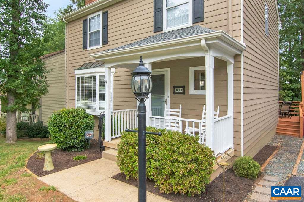 809 Harris Road Charlottesville, VA 22902 - Photo 3 of 39 a front view of a house with garden
