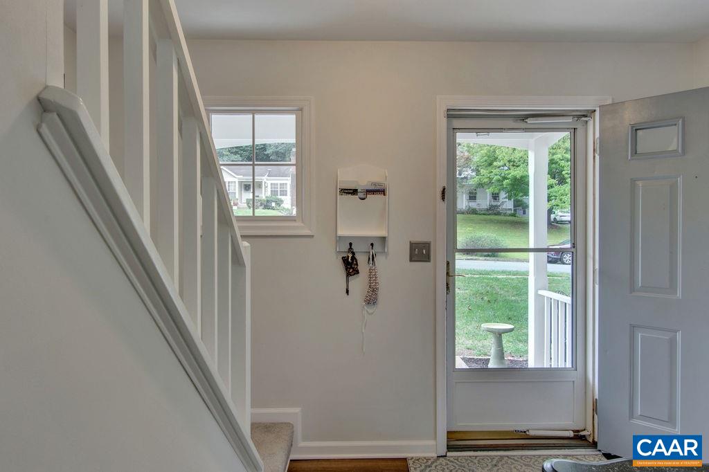 809 Harris Road Charlottesville, VA 22902 - Photo 5 of 39 a view of an entryway with a floor to ceiling window