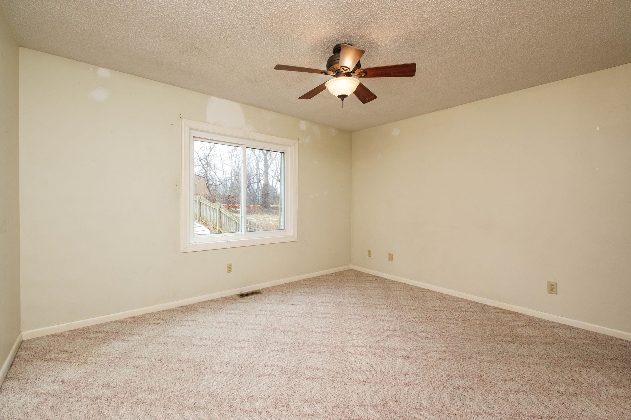 2062 Rosedale Court Harrisonburg, VA 22801 - Photo 18 of 24 a view of an empty room with a window