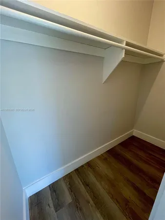 a view of small space with racks on the wall