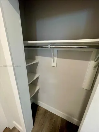 a view of small space with racks on the wall