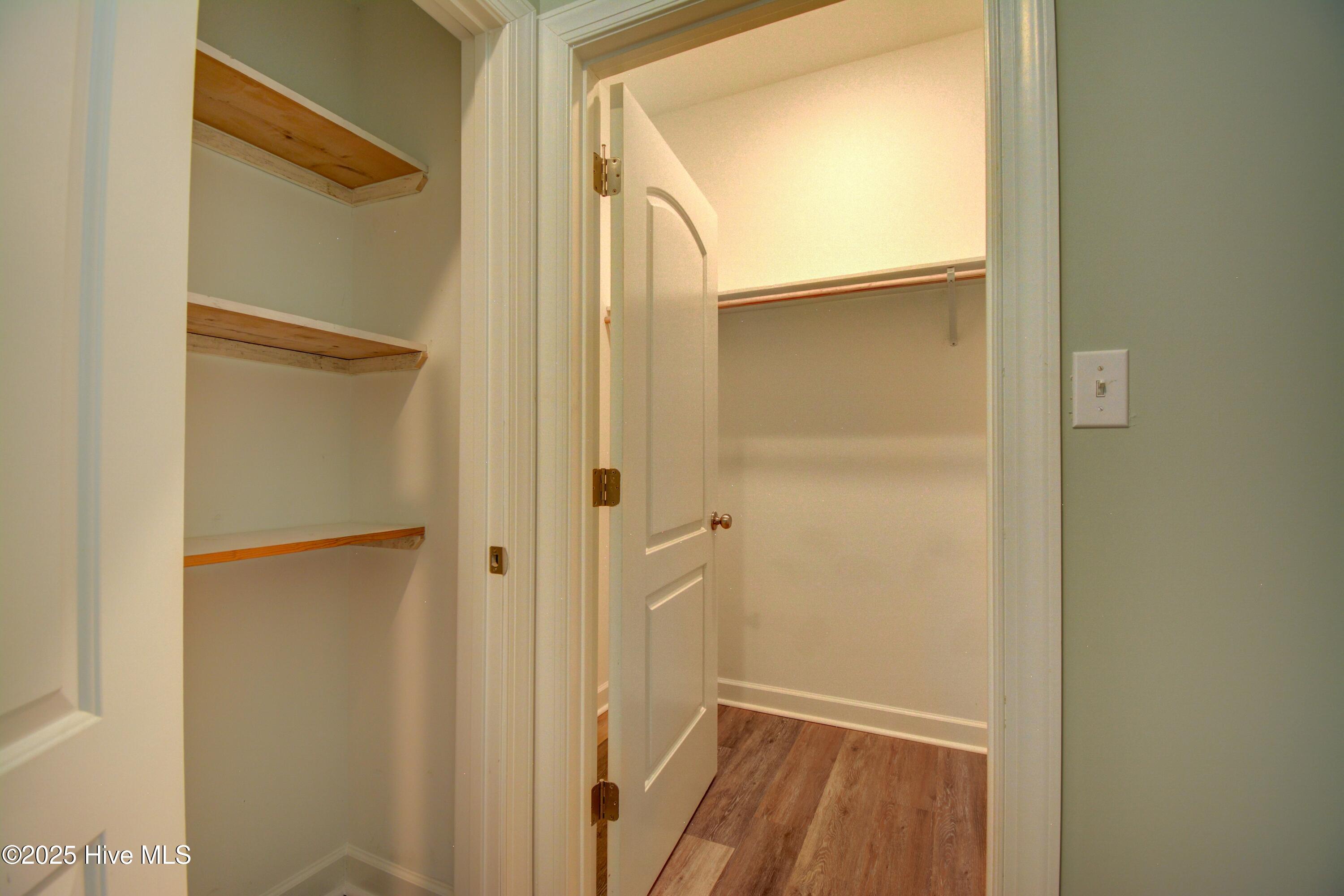 320 Belt Road Hampstead, NC 28443 - Photo 11 of 38 Walk-in closet off private bath and ground level bedroom