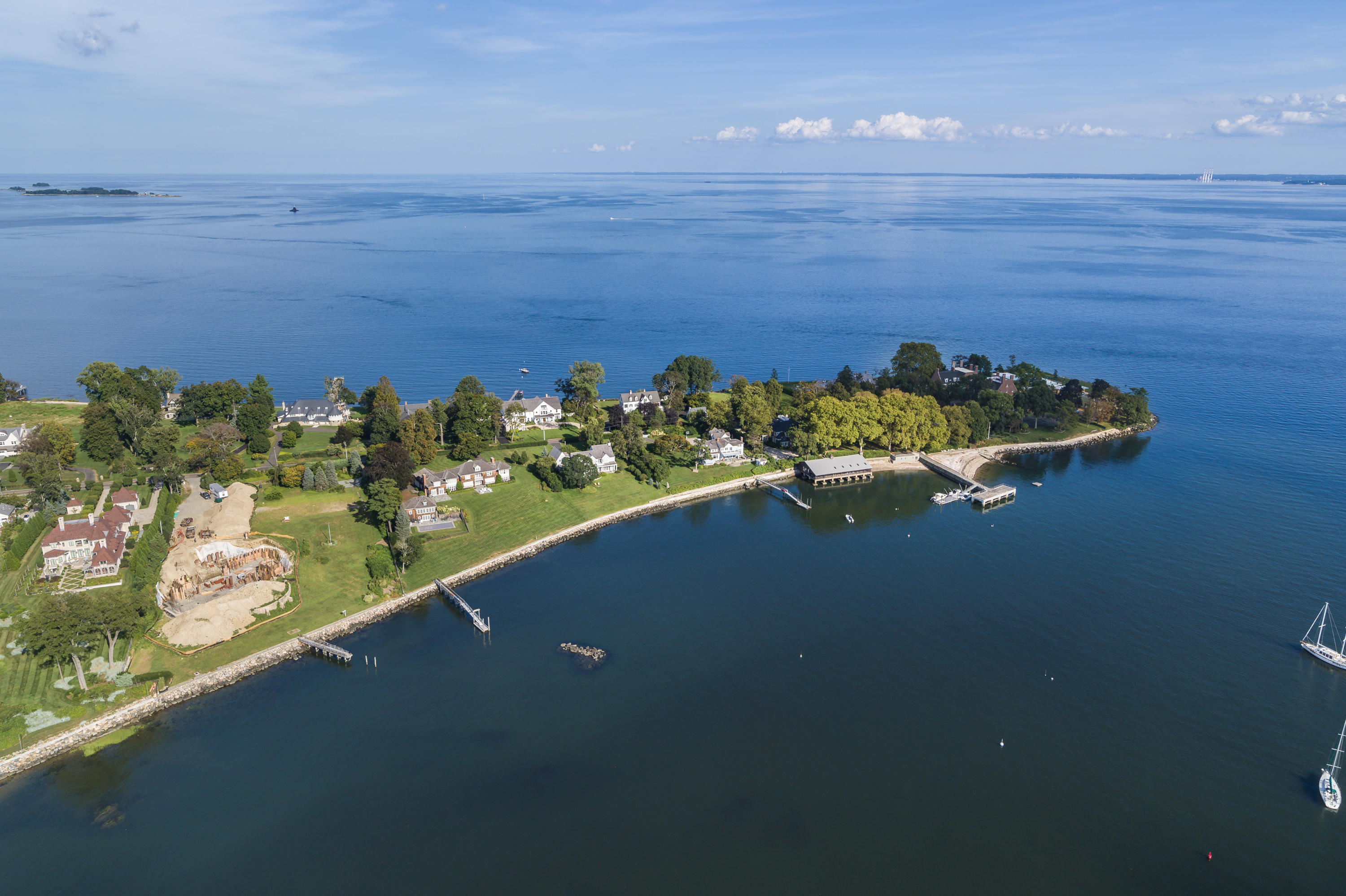 241 Long Neck Point Road Darien, CT 06820 - Photo 15 of 29 a view of a lake with a mountain in the background