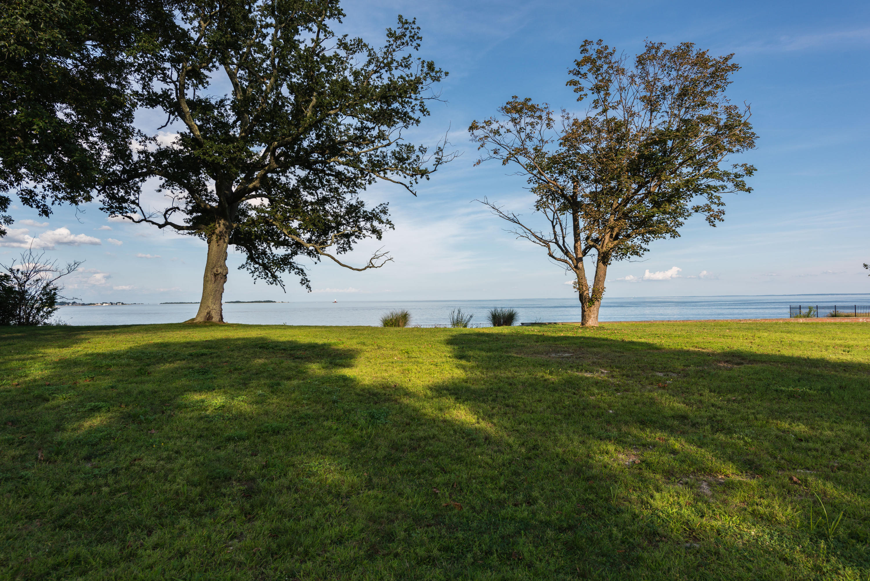241 Long Neck Point Road Darien, CT 06820 - Photo 18 of 29 a view of yard with swimming pool and green space