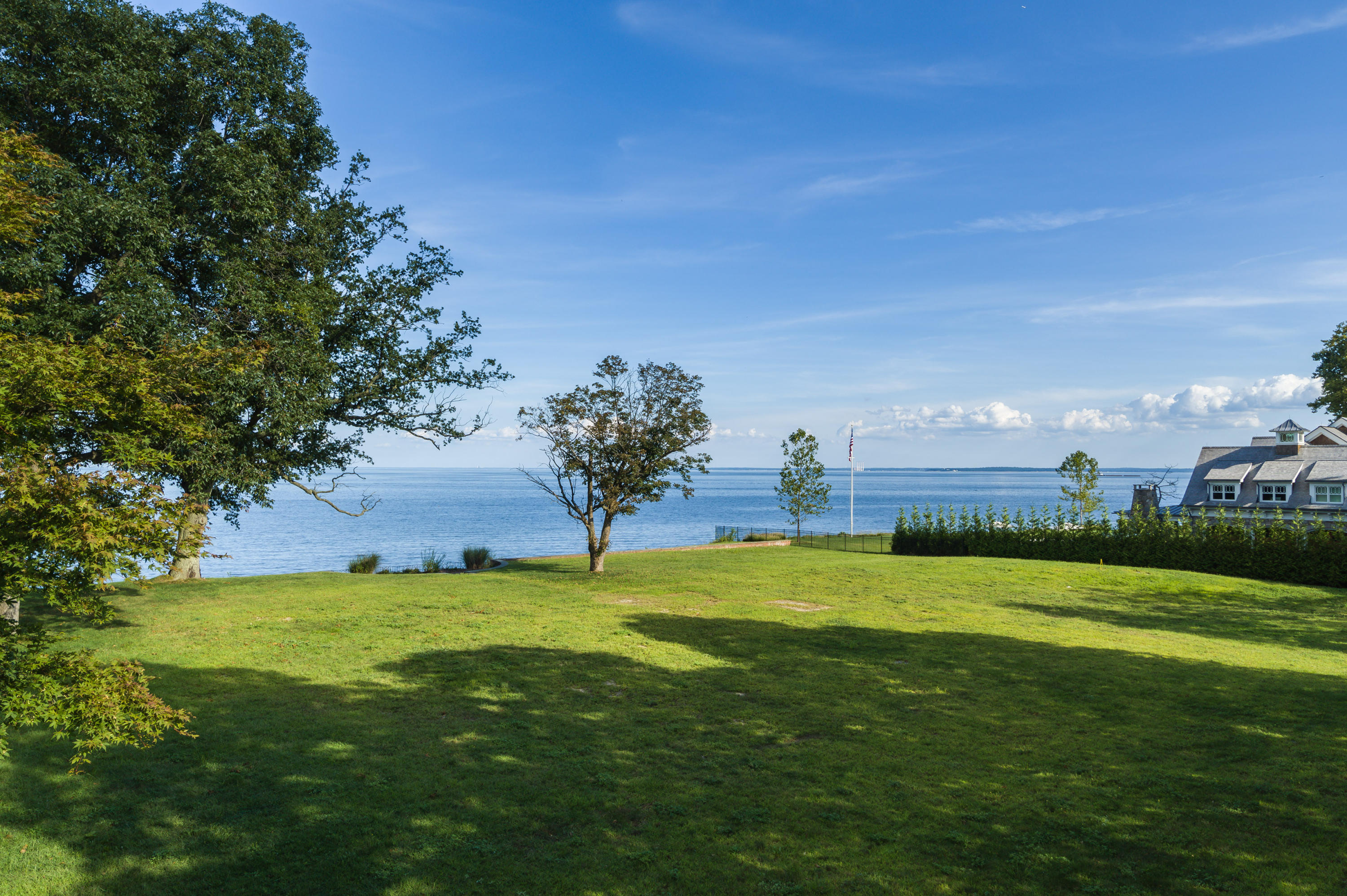 241 Long Neck Point Road Darien, CT 06820 - Photo 22 of 29 a view of an outdoor space and a yard
