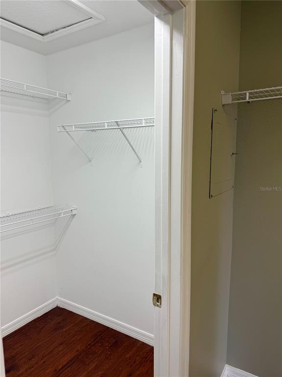 1037 Berkeley Drive Kissimmee, FL 34744 - Photo 22 of 38 a view of an empty walk in closet