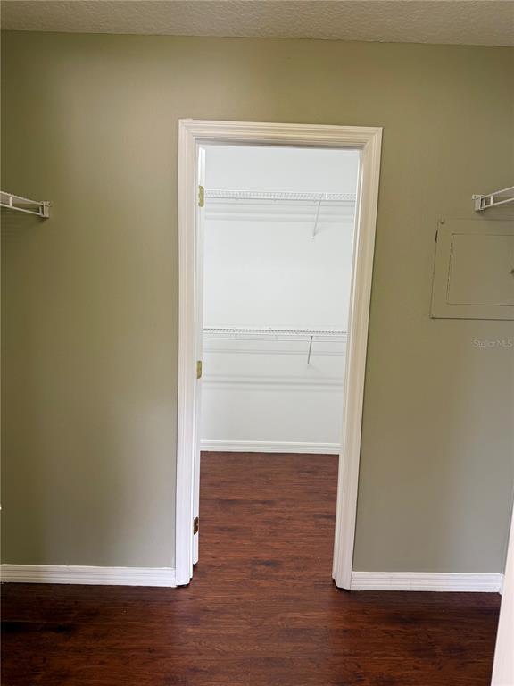 1037 Berkeley Drive Kissimmee, FL 34744 - Photo 23 of 38 a view of front door with wooden floor