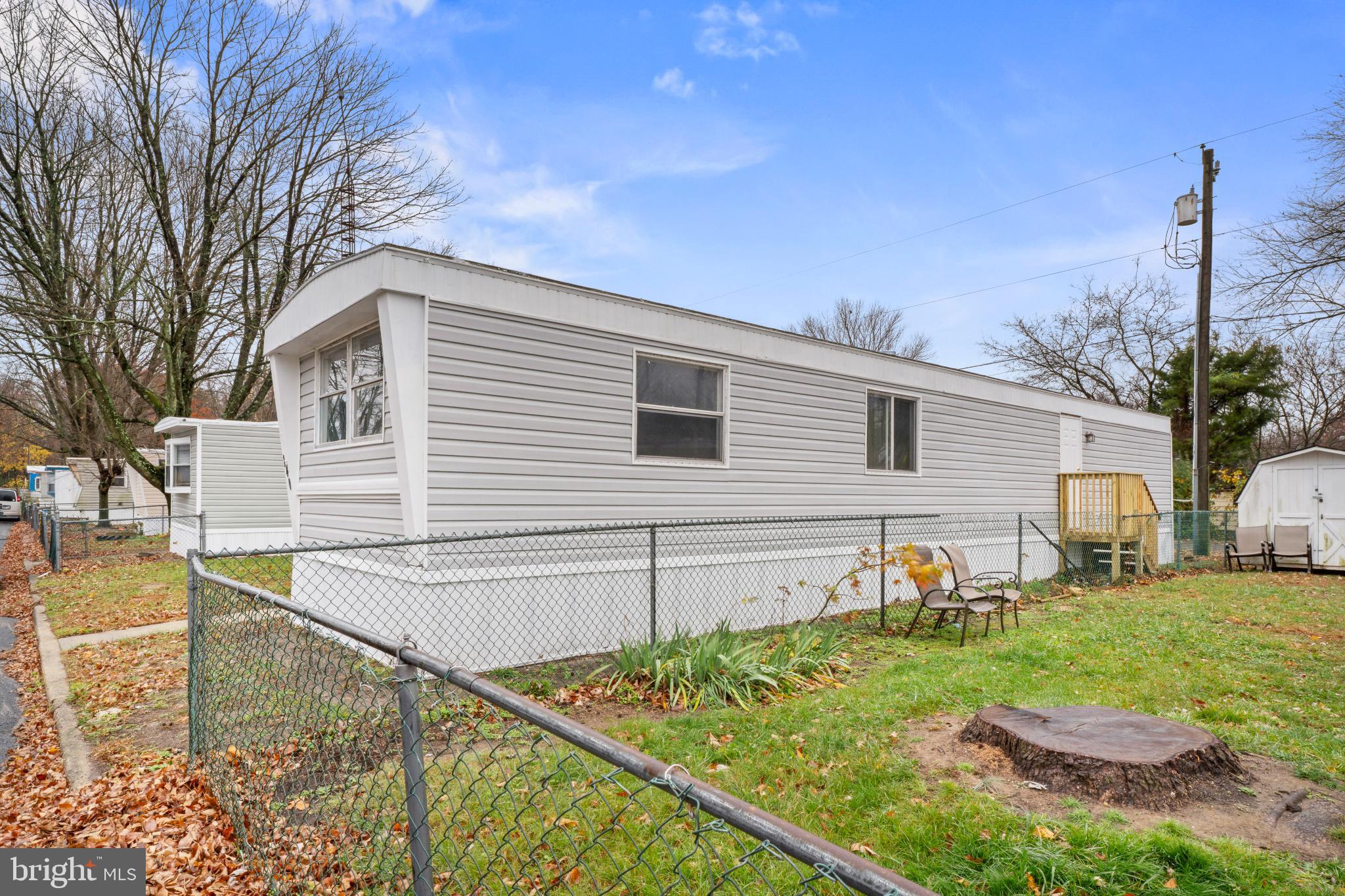 868 East Commerce Street Bridgeton, NJ 08302 - Photo 6 of 6 a view of a house with backyard and sitting area