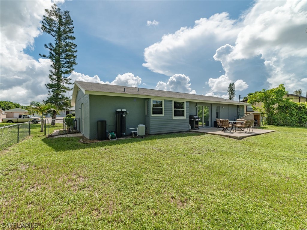 18558 Sunflower Road Fort Myers, FL 33967 - Photo 15 of 18 a house view with swimming pool and garden space
