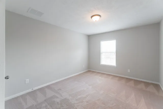 an empty room with a window