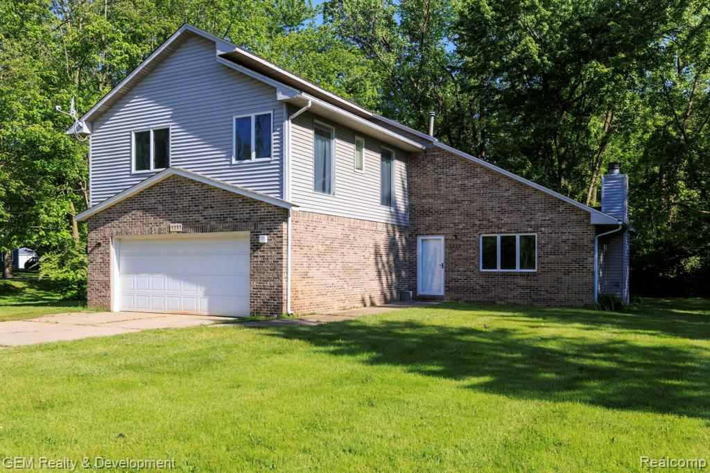 1111 Sarah Road Pinckney, MI 48169 - Photo 1 of 47