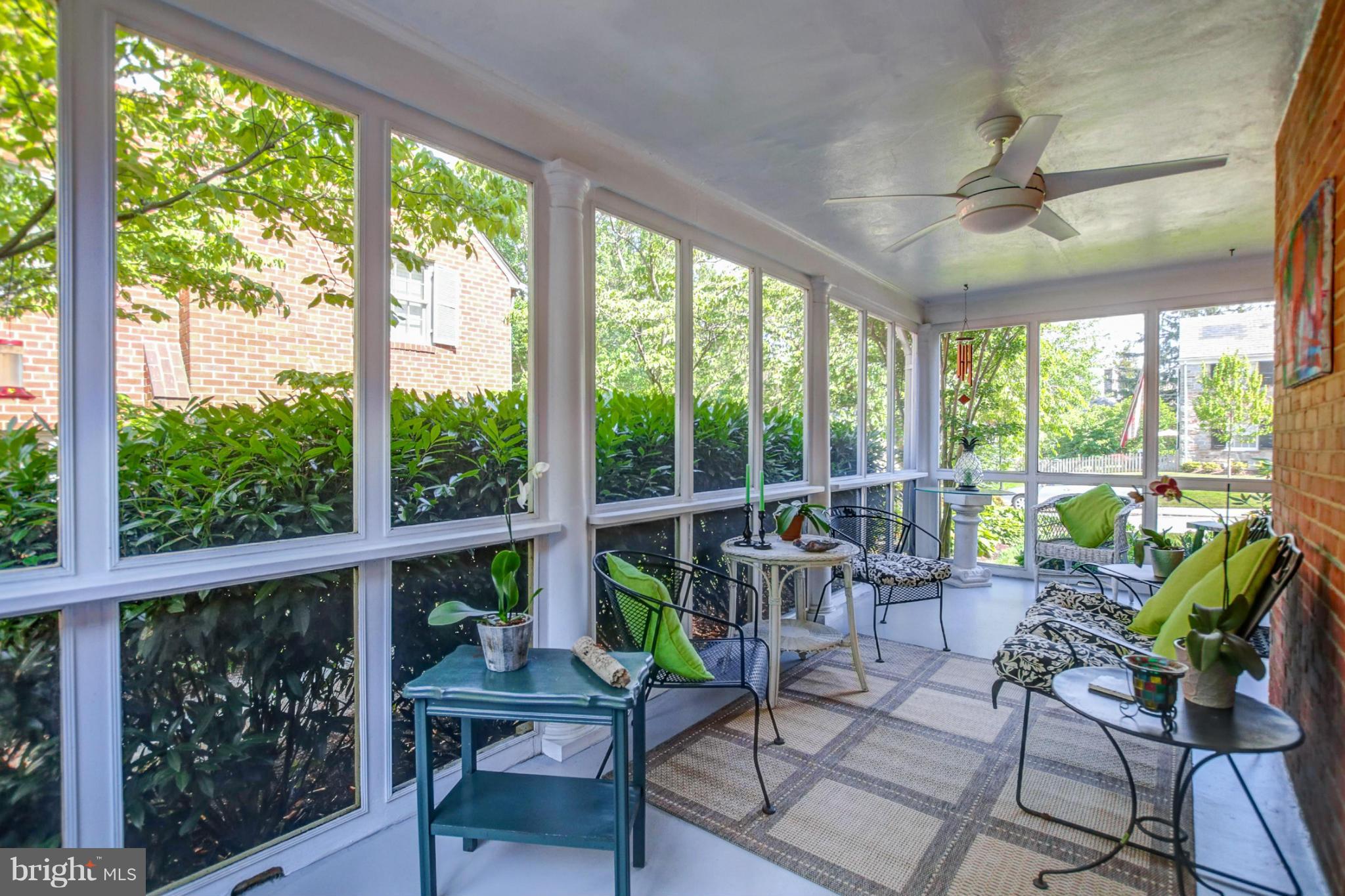 116 Croydon Road Baltimore, MD 21212 - Photo 12 of 30 a living room with furniture and floor to ceiling windows