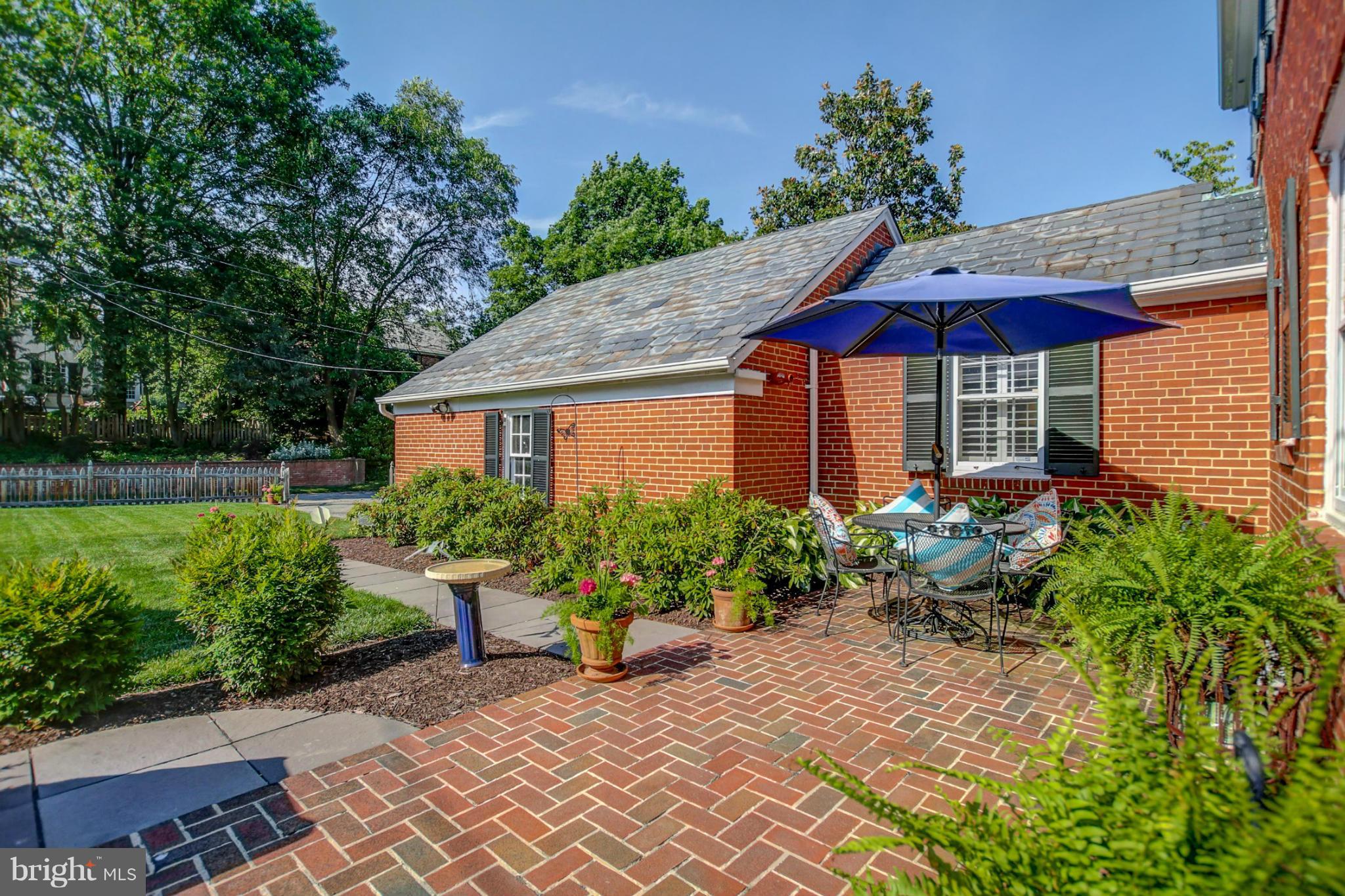 116 Croydon Road Baltimore, MD 21212 - Photo 28 of 30 a view of a house with sitting area and garden