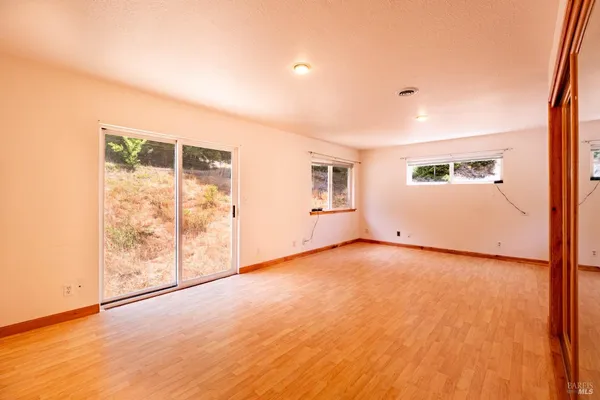 an empty room with windows