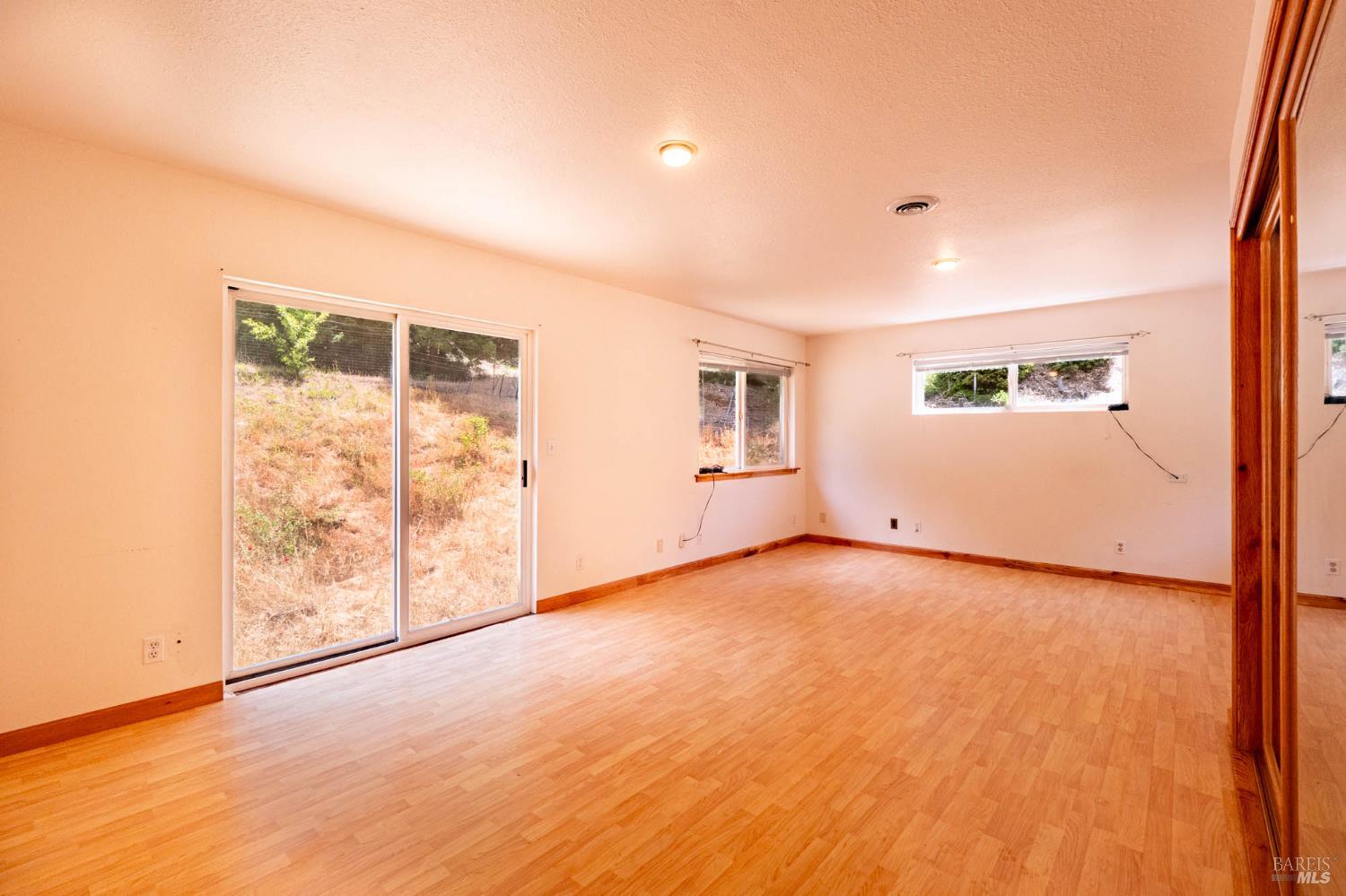 44150 Nash Mill Road Philo, CA 95466 - Photo 13 of 29 an empty room with windows