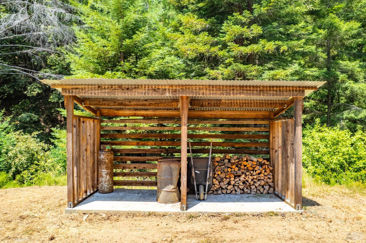 44150 Nash Mill Road Philo, CA 95466 - Photo 19 of 29 a view of a wooden house with a outdoor space