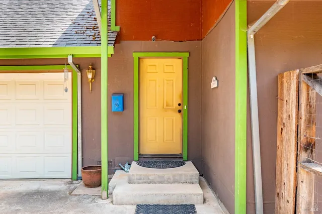 a front view of a house with a door