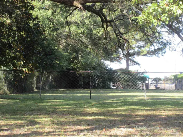 a view of outdoor space and yard