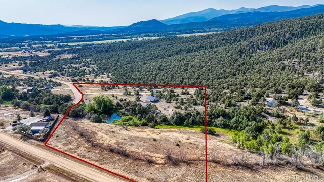 a view of a park with a mountain